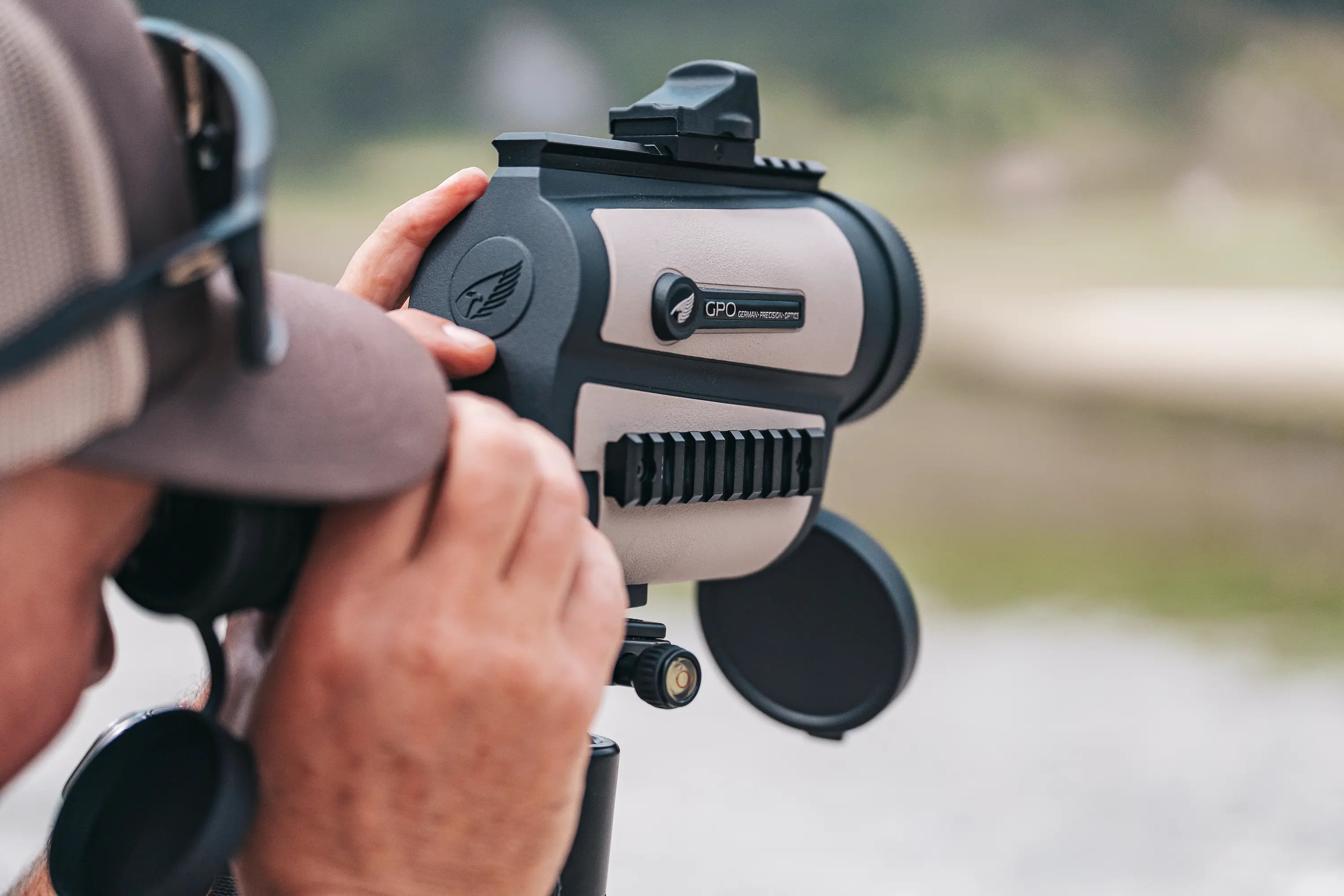 Spotting scope, tripod, hand
